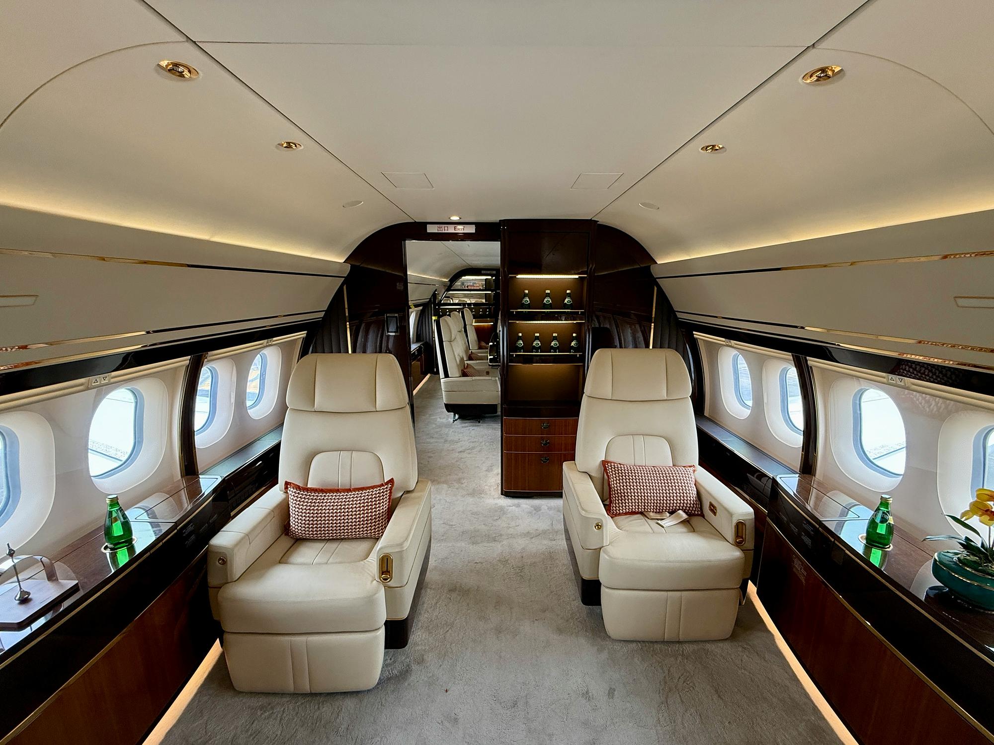 Luxurious light jet cabin interior with leather seating
