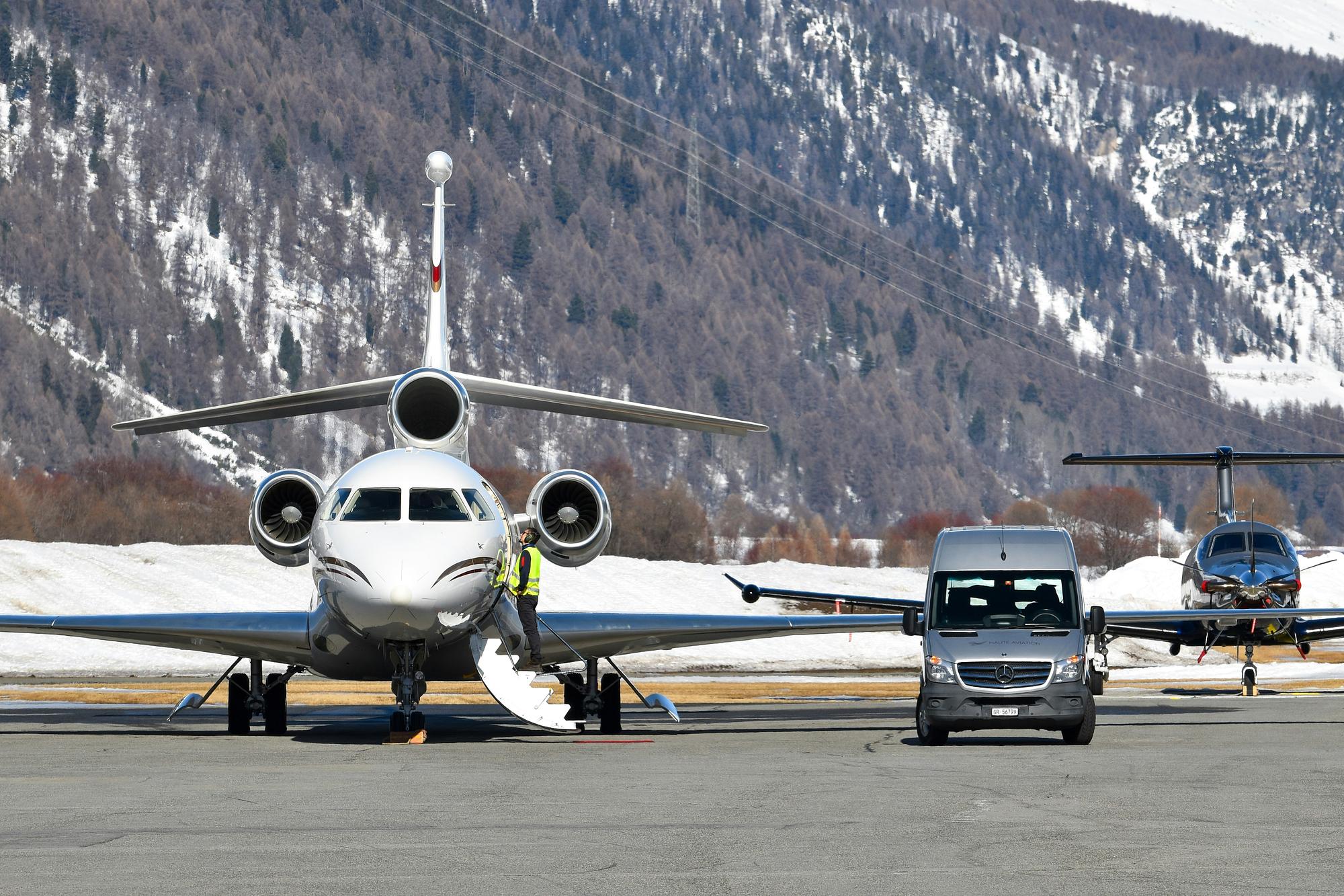 a Dassault Falcon private jet on the tarmac